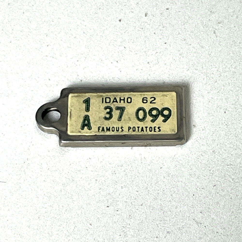 1962 Idaho Famous Potatoes DAV Tag Keychain License Plate Ada County 1A 37 099